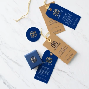 Labels & Tags premium custom printed product labels and hang tags with branded design, string attachments, and luxury packaging presentation.